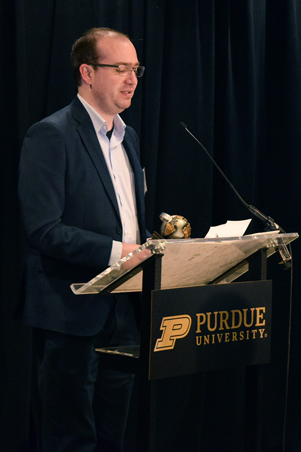 David Arnas speaking at a lectern
