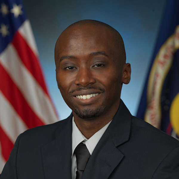 Kamwana Mwara portrait with American flag