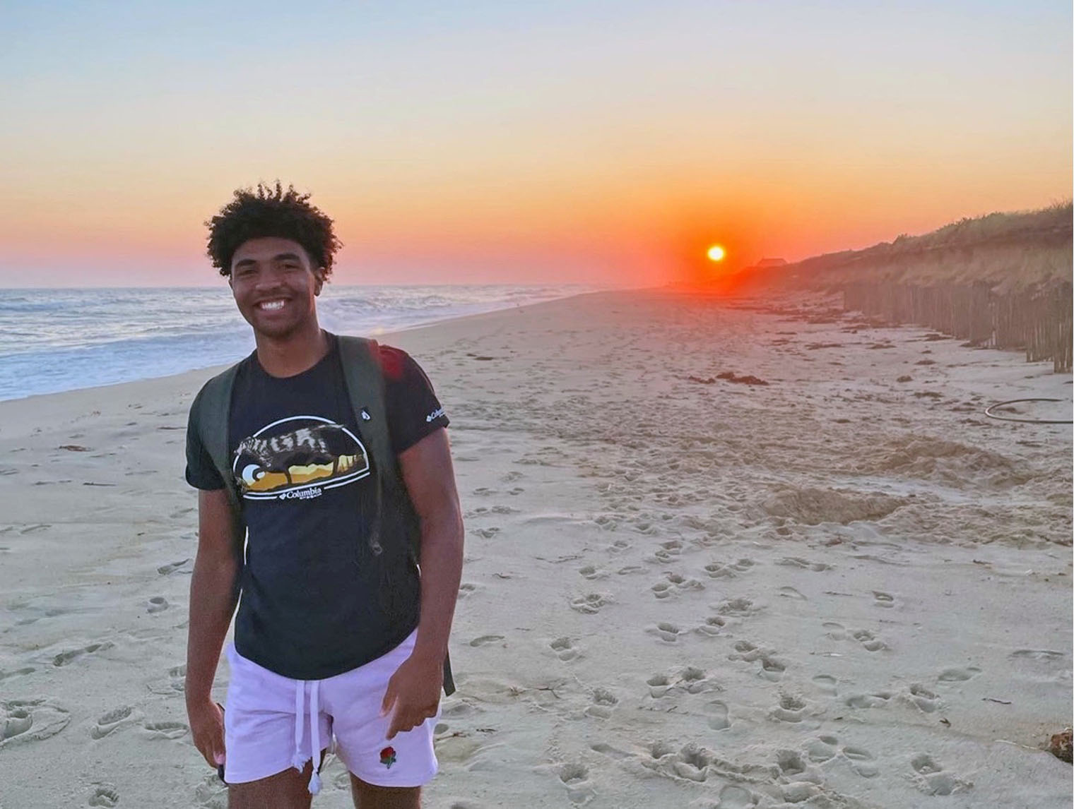 Adam Bullock on a beach