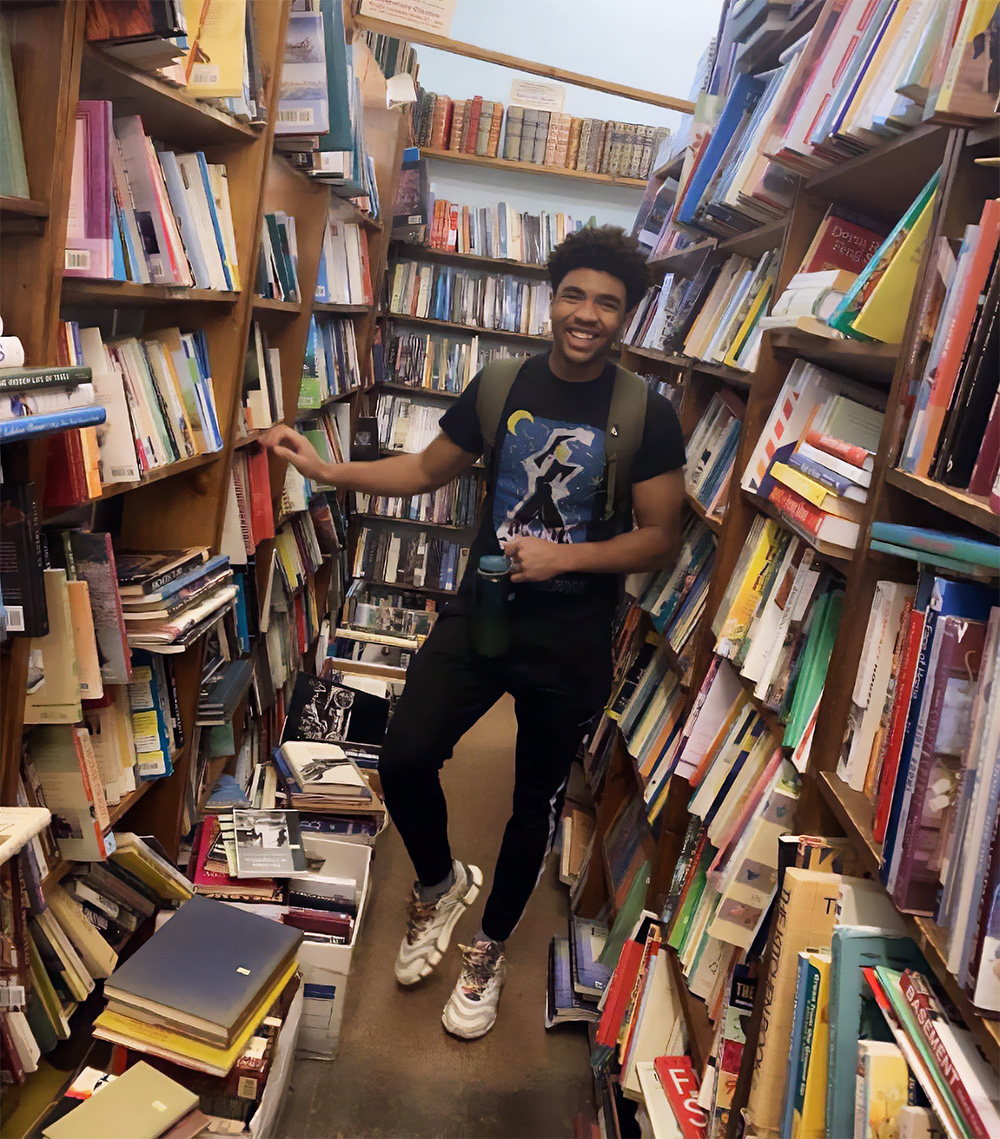 Adam Bullock in a library