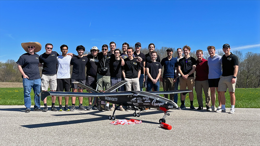 group photo with aircraft