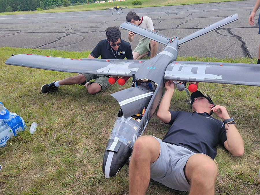 group photo with aircraft