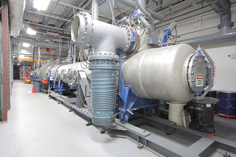 A large device made up of large steel tanks and tubes.