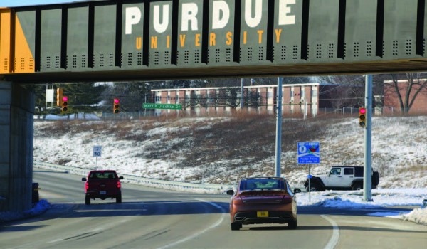 Instrumented Ford vehicle (at right) used to populate database for roadway infrastructure condition maps.