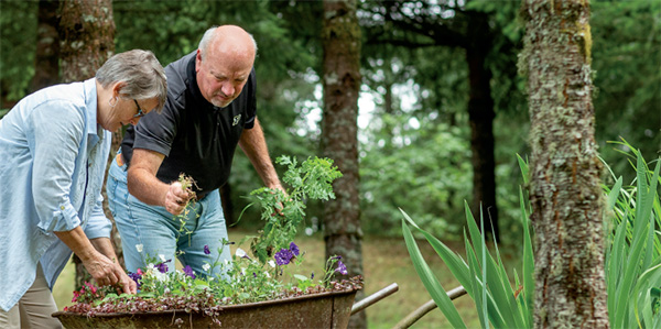 ENJOYING LIFE: Jim Cure (BSCE '75) and his wife, Carol, who have given more than $5.25 million to Purdue's Lyles School of Civil Engineering, in and around their home in the Portland, Oregon, area.