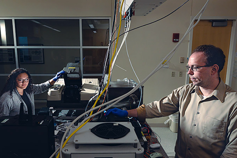 student in lab with peter bermel