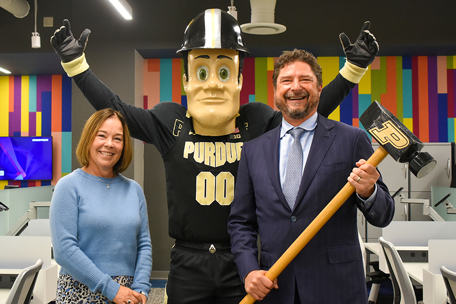 laura chiminski, purdue pete, and john chiminski in the new collaborative research hub