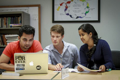 Three students working together