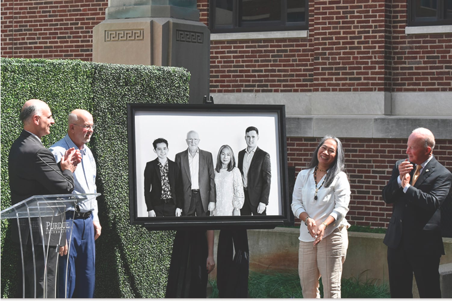 Photo of ceremony to name new hall