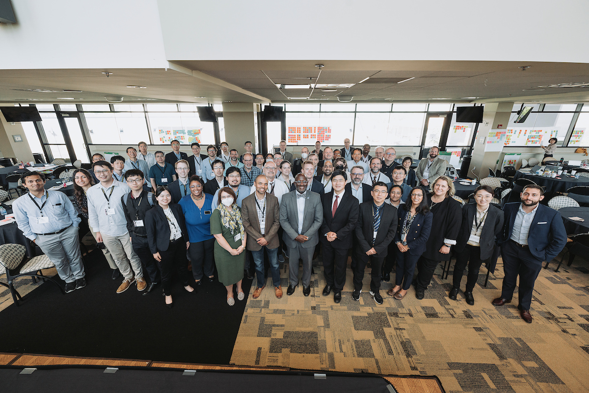 Group photo of attendees with Dr. Mung Chiang.