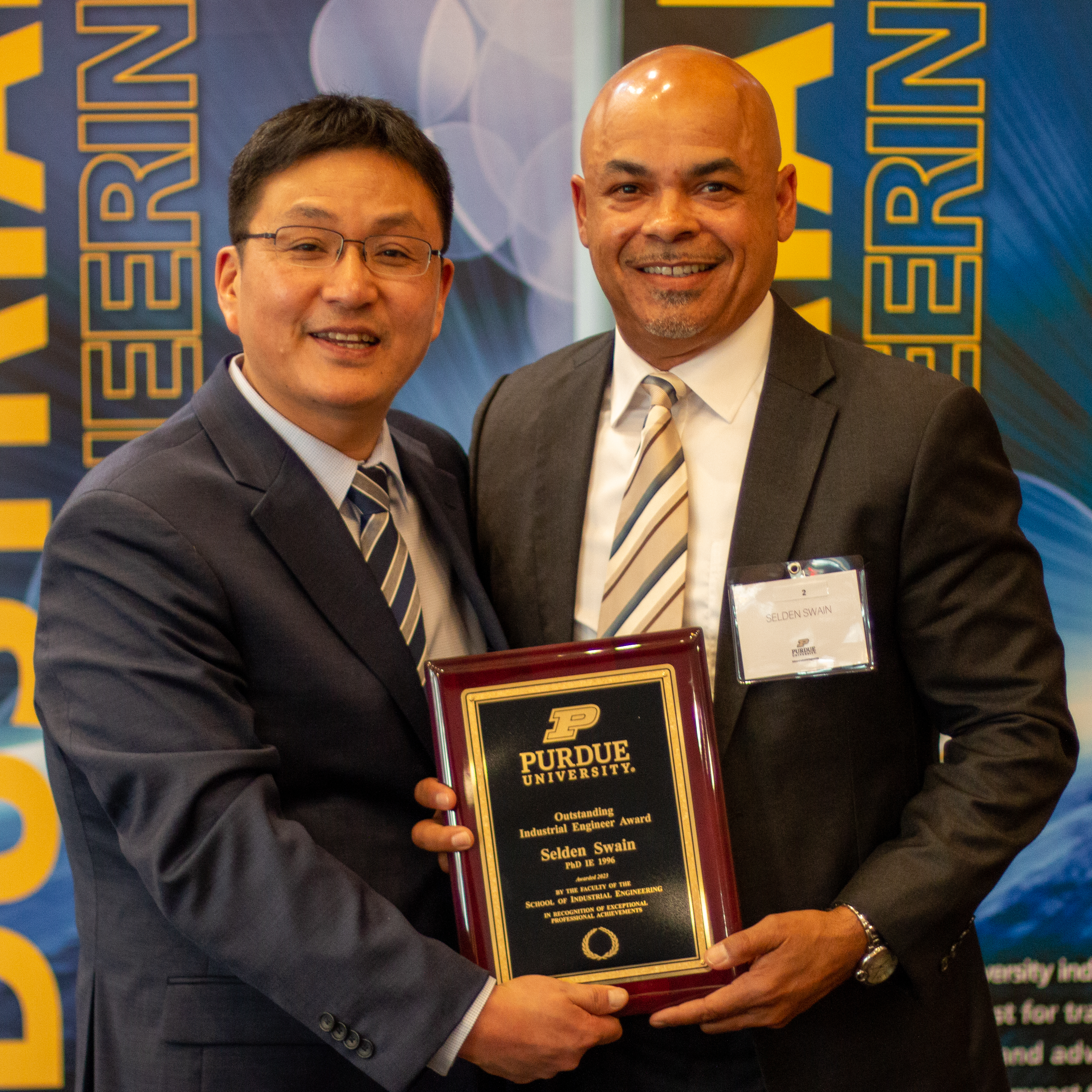 Posing with Dr. Son after accepting award.