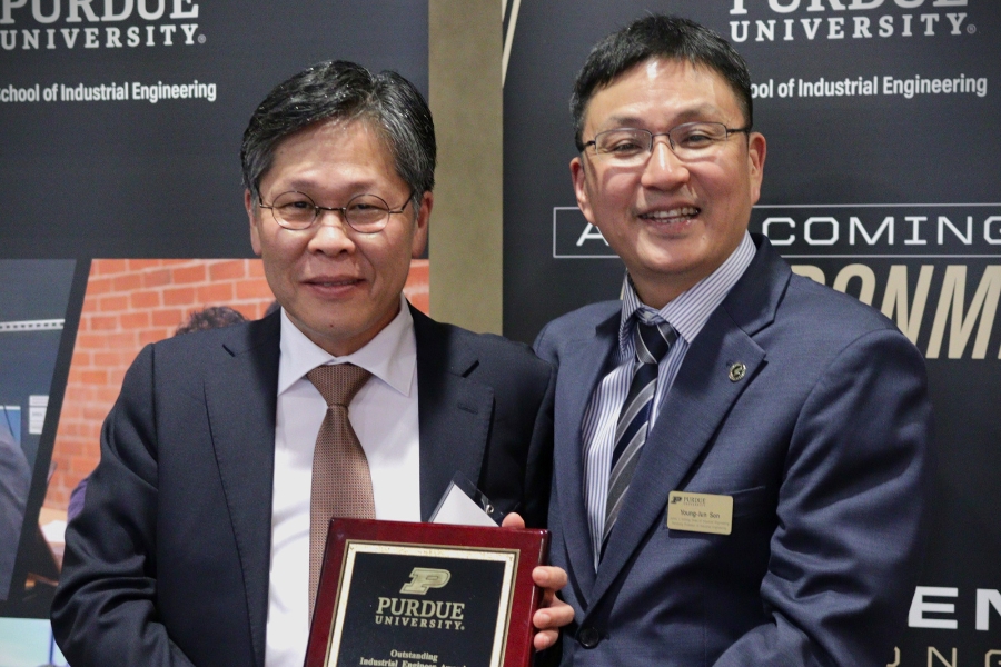 Posing with Dr. Son after accepting award.