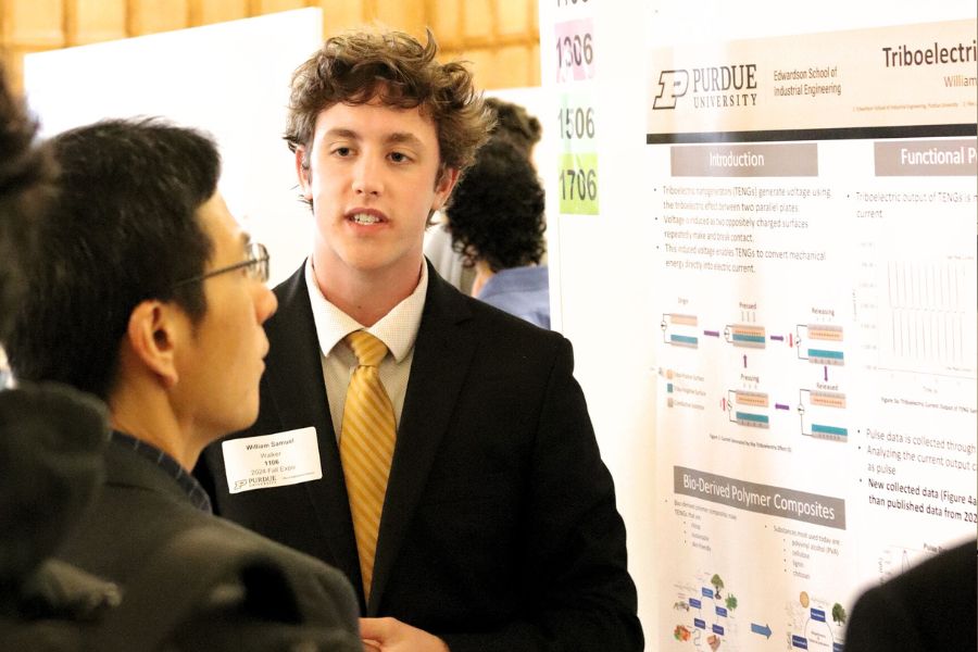 Assistant Professor Denny Yu accepting his most recent award