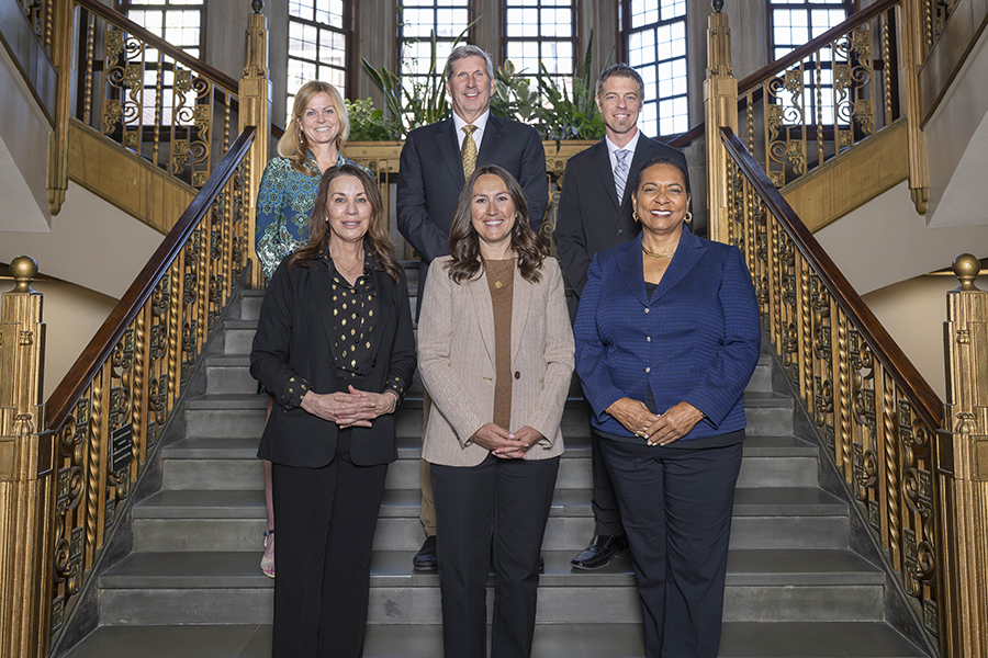 Six people standing on the steps at Purdue Memorial Union